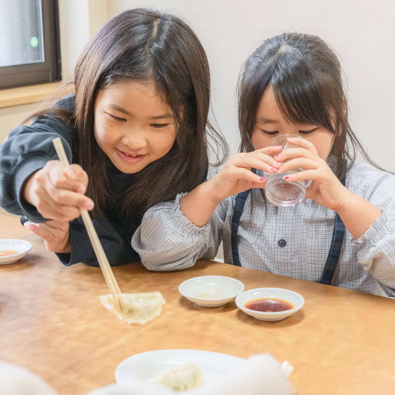 笑顔咲く肉汁餃子